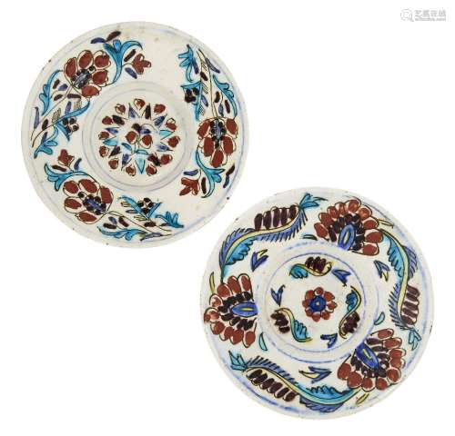 Two Kütahya polychrome pottery dishes, Turkey, second half 18th century, one painted underglaze in