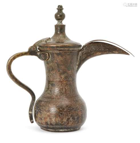 An engraved copper ewer with inscription, Syria or Turkey, 17th/18th century, 23cm. highPlease refer