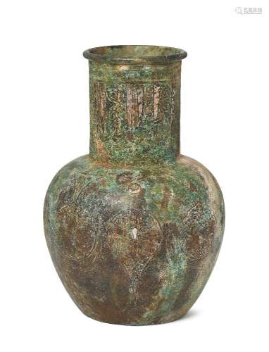 A Ghaznavid engraved bronze vase, Iran, 14th century and later, on flat base, with rounded