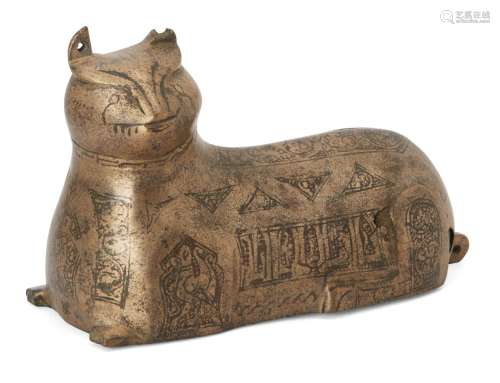 A Khorasan bronze weight in the form of a lion, Iran, 12th century, cast in the form of a