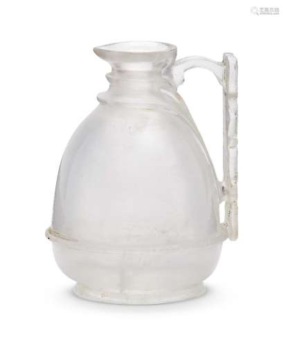 A small rock crystal ewer with carved handle, 19th-20th century, in an early 20th century fitted