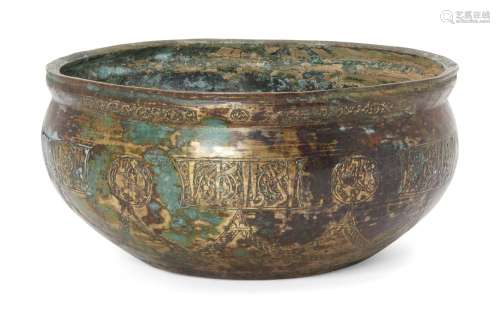 A Khorasan engraved bronze bowl, Iran, 12th century, of deep form, engraved to sides with a series
