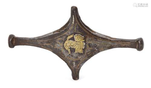 A bronze sword fitting with brass lion, Iran or possibly Korea, 12th-14th century, of cruciform