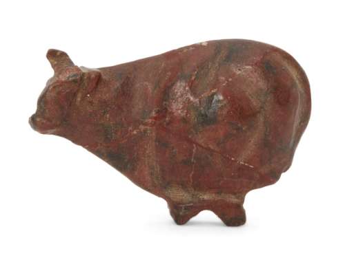 An Egyptian New Kingdom red jasper trussed ox amulet, 18th - 20th Dynasty, circa 1550 - 1070 BC.,