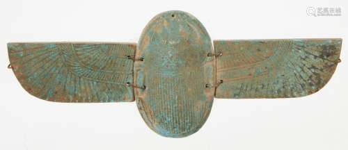 A large Egyptian-style blue faience winged scarab, the separately-made body and two wings perforated