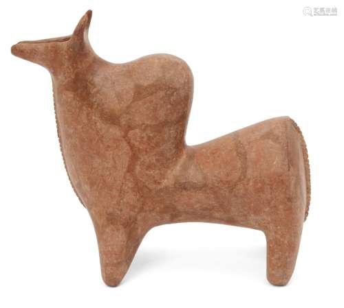 A substantially restored North West Iranian pottery rhyton in the form of a bull with prominent hump