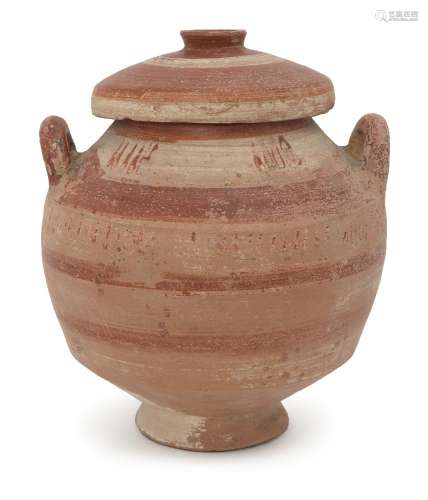 A Messapian pottery lidded stamnos, circa 4th century BC., the lid with banded decoration in red and