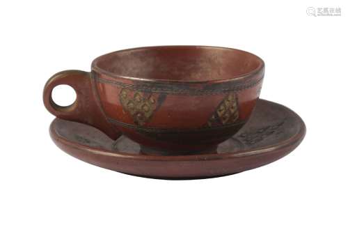 A Tophane ware pottery cup and saucer, Turkey, 19th century, red earthenware with gilt decoration,