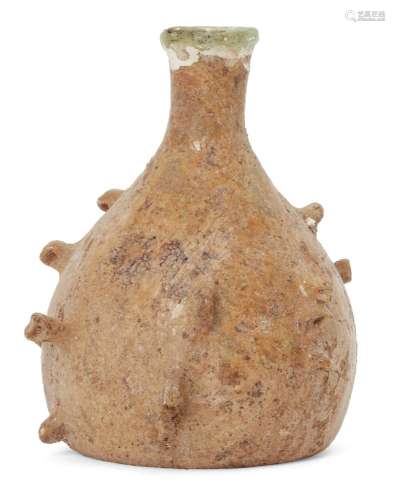 A Roman bottle with pinched projections, Eastern Mediterranean, circa 5th-6th century AD., the