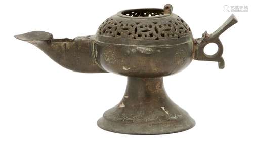 A Khorasan openwork oil lamp, Iran, 12th century, on trumpet foot, the round body with openwork