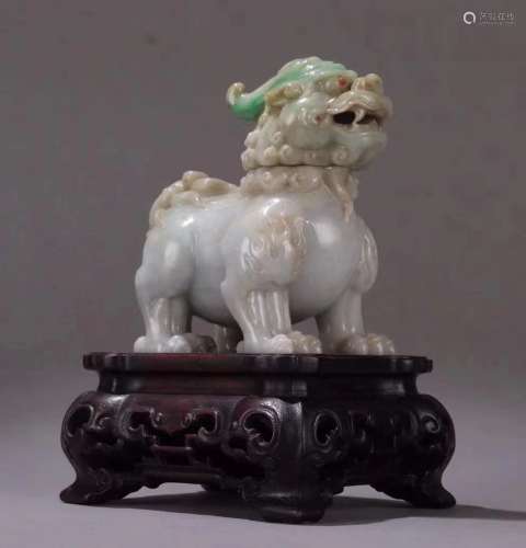 A Chinese Carved Jadeite Beast With Base