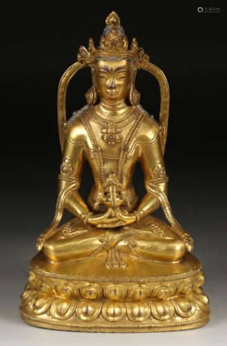 A TIBETAN GILT BRONZE CAST BUDDHA STATUE