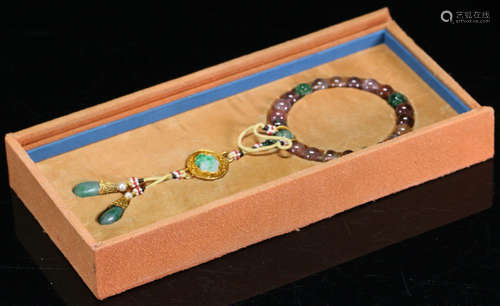 A TOURMALINE BRACELET WITH JADEITE