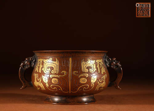 A GILT BRONZE CAST BEAST PATTERN CENSER