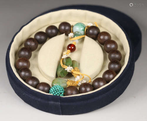 A CHENXIANG WOOD BRACELET WITH TURQUOISE JADEITE