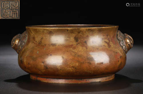 A COPPER CAST BEAST PATTERN EAR CENSER