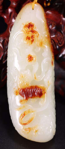 A HETIAN JADE CARVED LION PATTERN PENDANT