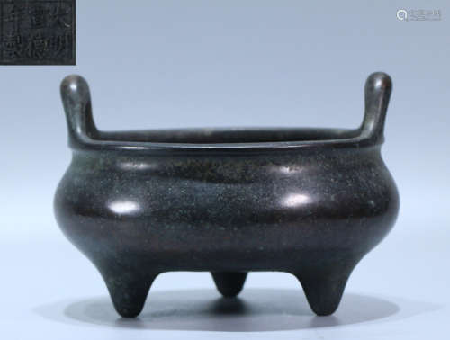 A COPPER CAST DOUBLE EAR CENSER