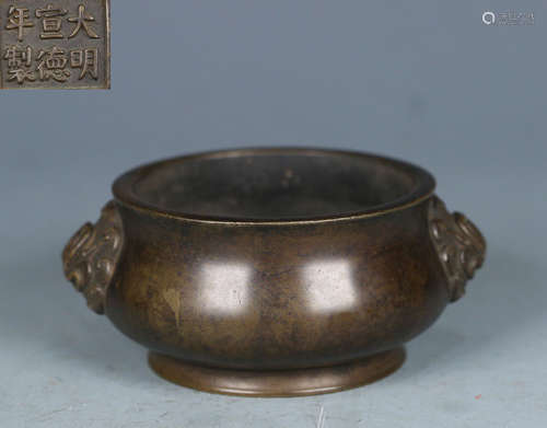 A COPPER CAST DOUBLE EAR CENSER