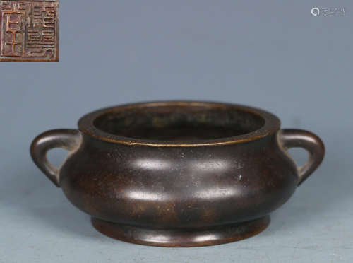 A COPPER CAST DOUBLE EAR CENSER