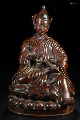 A CHENXIANG WOOD CARVED TIBETAN BUDDHA STATUE