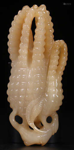 A HETIAN JADE CARVED CHAYOTE SHAPE PENDANT