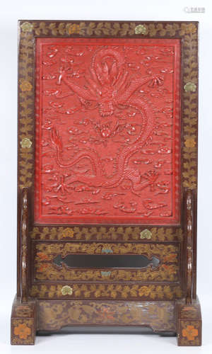 A RED LACQUER DRAGON PATTERN SCREEN