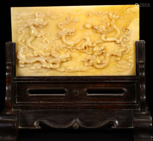 A SOAPSTONE CARVED BEAST PATTERN SCREEN