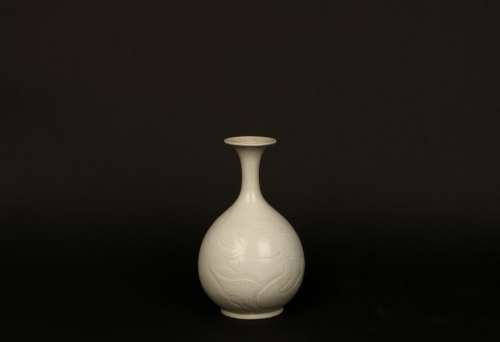 a chinese white glazed porcelain vase