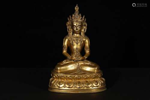 a chinese gilt bronze figure of buddha