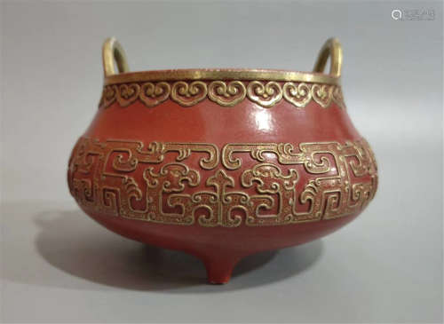 Qianlong carved flowers and gold three-legged incense burner in Qing Dynasty