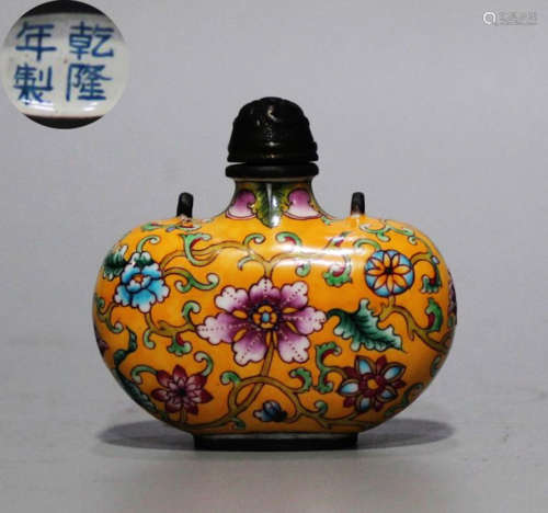 A ENAMELED GLAZE SNUFF BOTTLE PAINTED WITH FLOWER