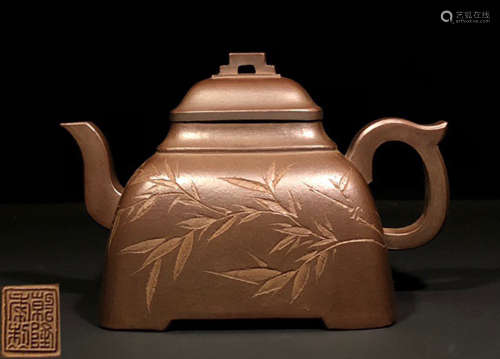 A ZISHA TEA POT CARVED WITH BAMBOO PATTERN