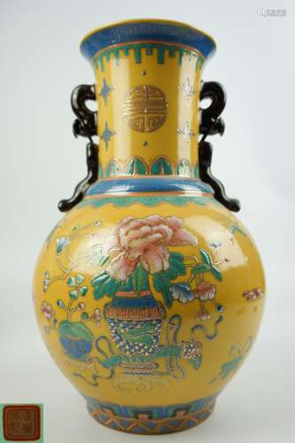 A KANGXI YUZHI MARK YELLOW GLAZED VASE