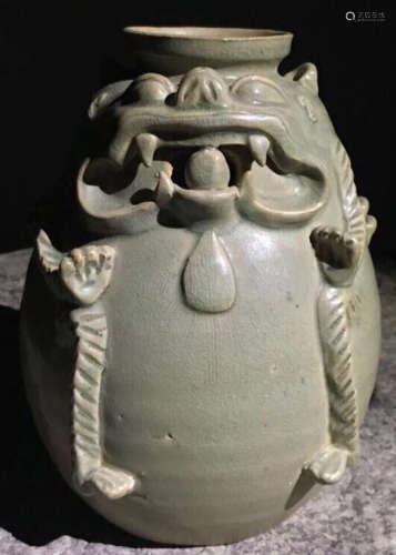 A YUE YAO GREEN GLAZE VASE CARVED WITH BEAST