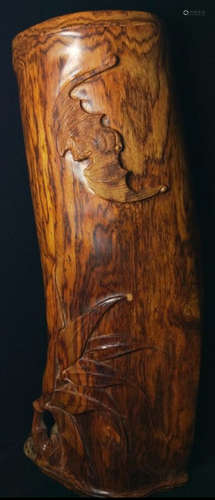 A HUANGHUA WOOD ORNAMENT CARVED WITH BAT