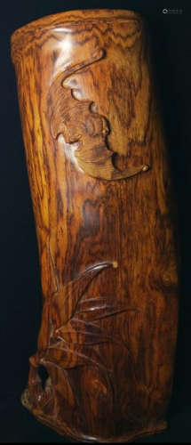 A HUANGHUA WOOD ORNAMENT CARVED WITH BAT