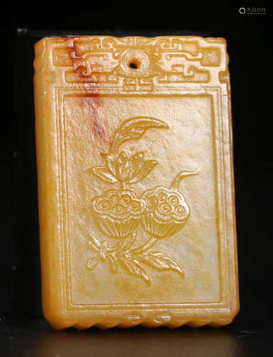 A HETIAN JADE TABLET CARVED WITH LOTUS