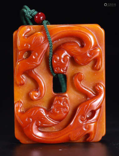 AN OLD HETIAN YELLOW JADE TABLET CARVED WITH DRAGON