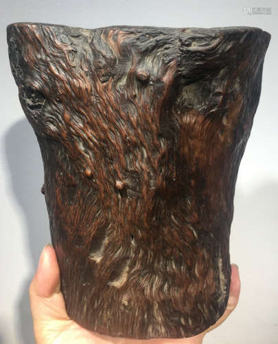 A WOOD CARVED BRUSH POT