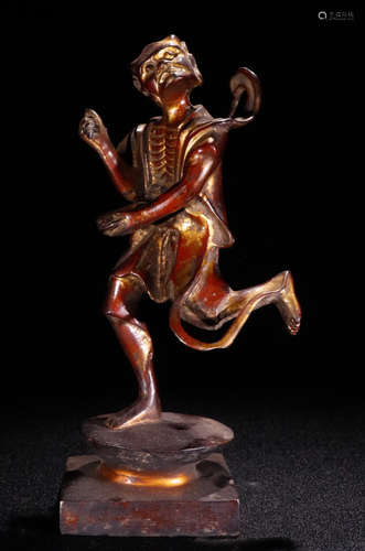 A GILT BRONZE CASTED KUIXINGDIANDOU STATUE