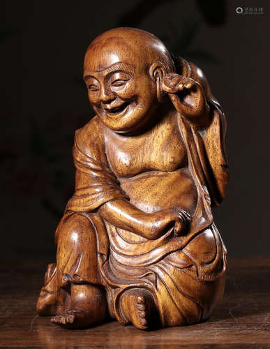 A HAINAN HUANGHUALI WOOD CARVED FIGURE STATUE