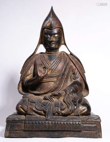 A GILT BRONZE CASTED TSONGKAHAPA STATUE