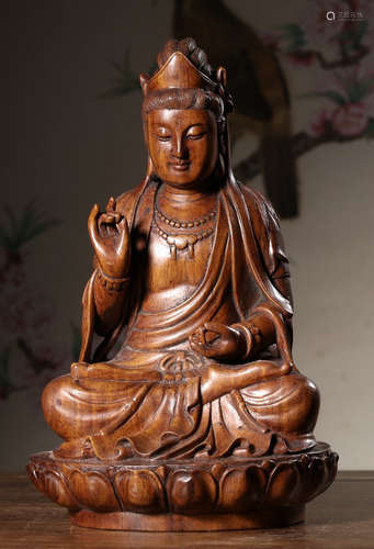 A HAINAN HUANGHUALI WOOD CARVED GUANYIN STATUE