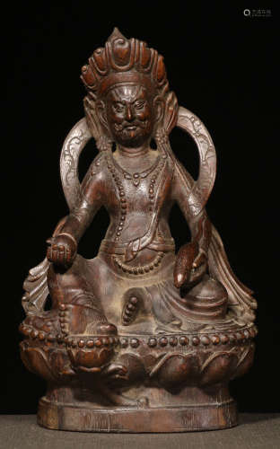 A CHENXIANG WOOD CARVED CAISHEN STATUE