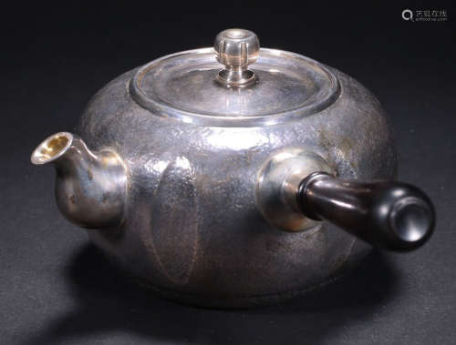A SILVER CASTED POT