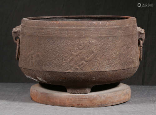 AN IRON CASTED DOUBLE EAR FIRE BOWL