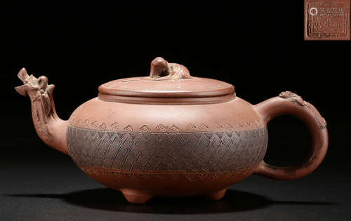 A ZISHA CARVED TRIPOD POT