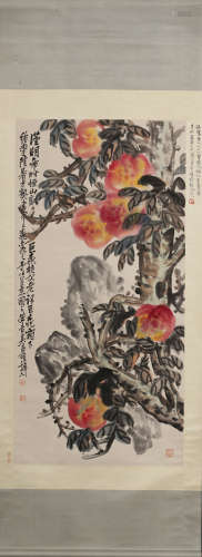 A PEACH VERTICAL AXIS PAINTING BY WUCHANGSHUO