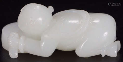 A HETIAN JADE CARVED CHILD SHAPE PENDANT